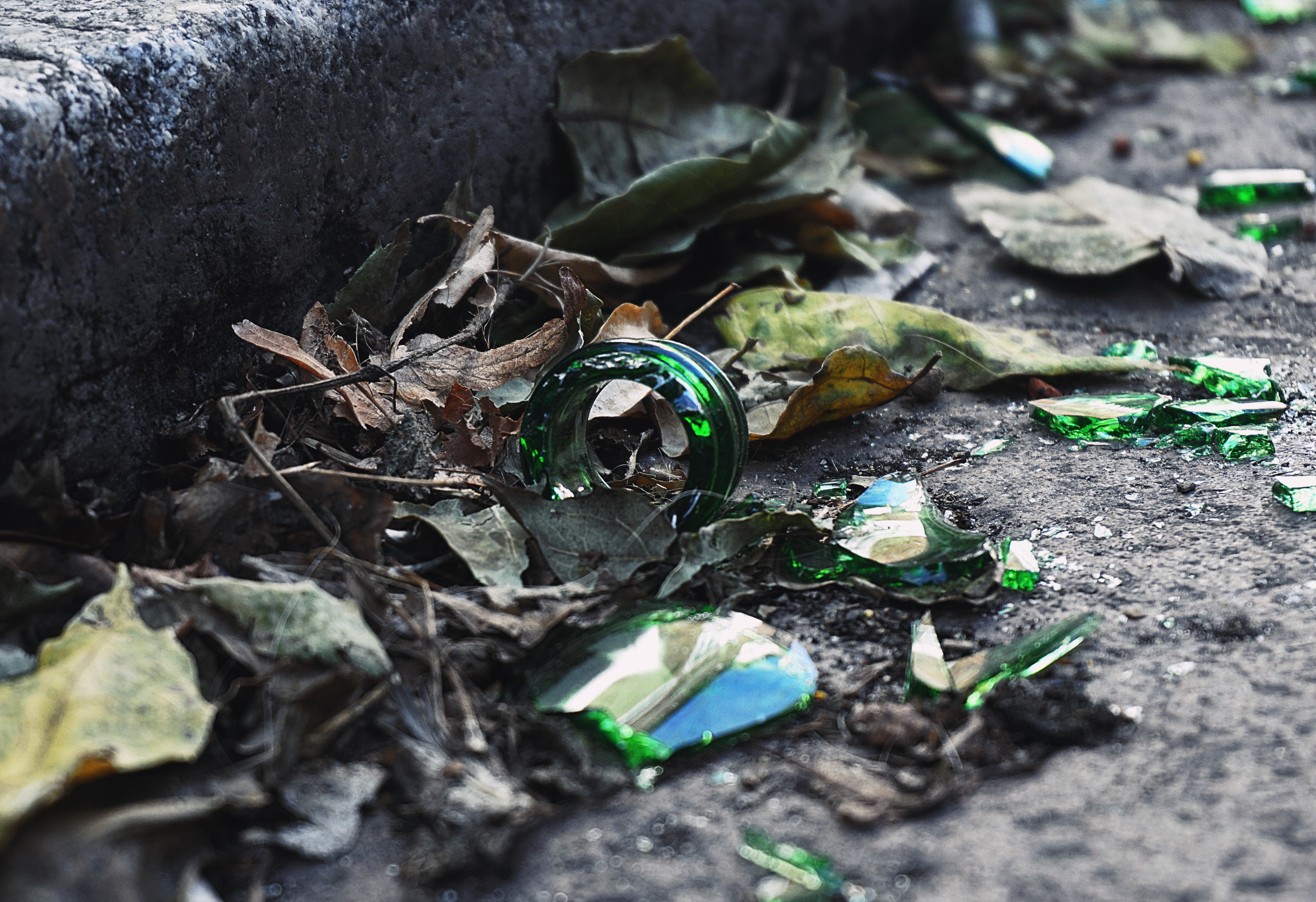 broken-glass-bottle-on-the-sidewalk-2955032.jpg